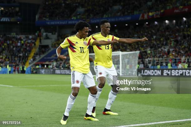 Juan Cuadrado of Colombia, Yerry Mina of Colombia during the 2018 FIFA World Cup Russia round of 16 match between Columbia and England at the Spartak...