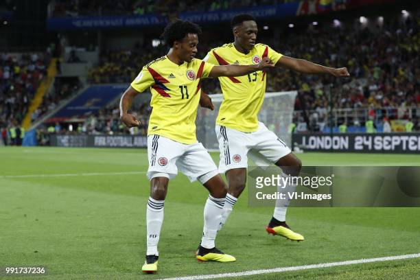 Juan Cuadrado of Colombia, Yerry Mina of Colombia during the 2018 FIFA World Cup Russia round of 16 match between Columbia and England at the Spartak...