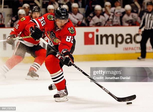 Tomas Kopecky of the Chicago Blackhawks passes the puck against the Columbus Blue Jackets at the United Center on January 14, 2010 in Chicago,...