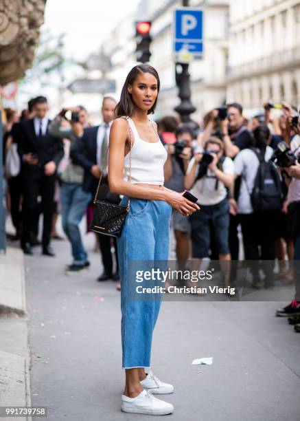 Model Cindy Bruna is seen outside Elie Saab on day four during Paris Fashion Week Haute Couture FW18 on July 4, 2018 in Paris, France.