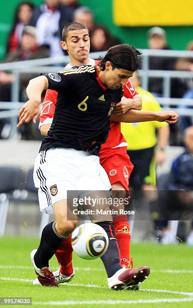 Sami Khedira of Germany and Ryan Fenech of Malta compete for the ball during the international friendly match between Germany and Malta at Tivoli...