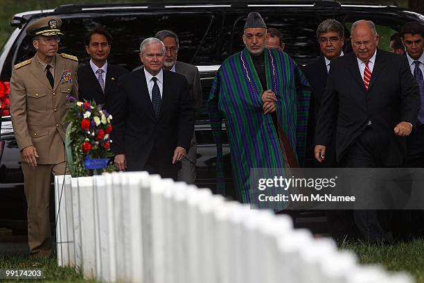Afghanistan President Hamid Karzai visits Section 60 at Arlington National Cemetery with U.S. Secretary of Defense Robert Gates , Chairman of the...