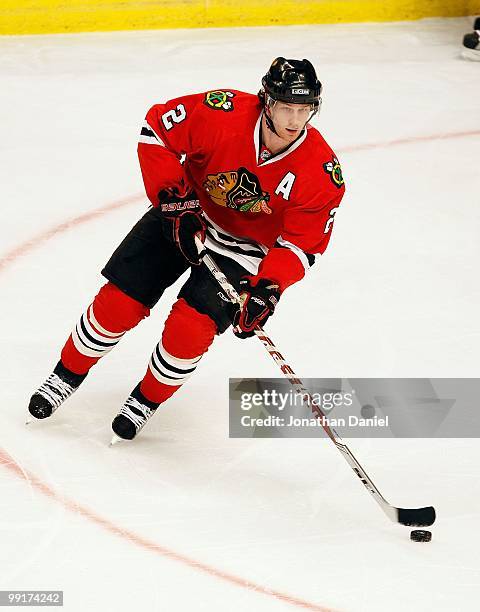 Duncan Keith of the Chicago Blackhawks looks to pass against the Nashville Predators at the United Center on December 4, 2009 in Chicago, Illinois....