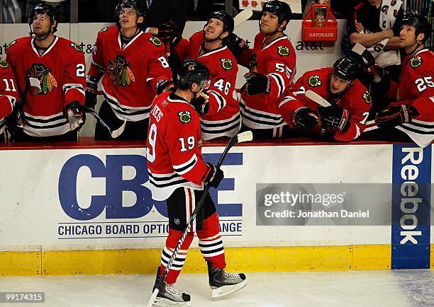 Jonathan Toews of the Chicago Blackhawks is congratulated by teammates after scoring a goal against the Nashville Predators at the United Center on...