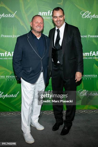 Kevin Robert Frost and Milutin Gatsby attend the amfAR Paris Dinner 2018 at The Peninsula Hotel on July 4, 2018 in Paris, France.