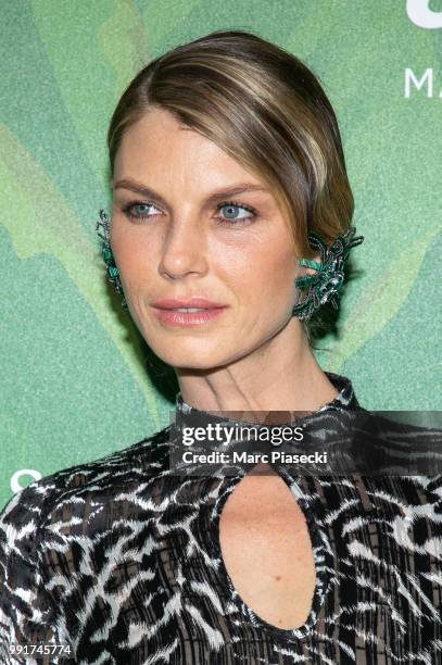 Model Angela Lindvall attends the amfAR Paris Dinner 2018 at The Peninsula Hotel on July 4, 2018 in Paris, France.