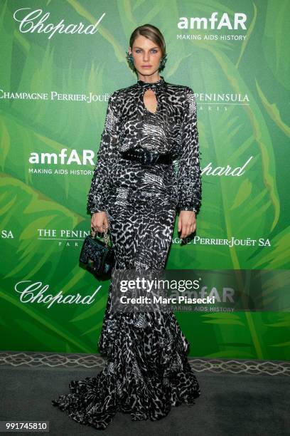 Model Angela Lindvall attends the amfAR Paris Dinner 2018 at The Peninsula Hotel on July 4, 2018 in Paris, France.