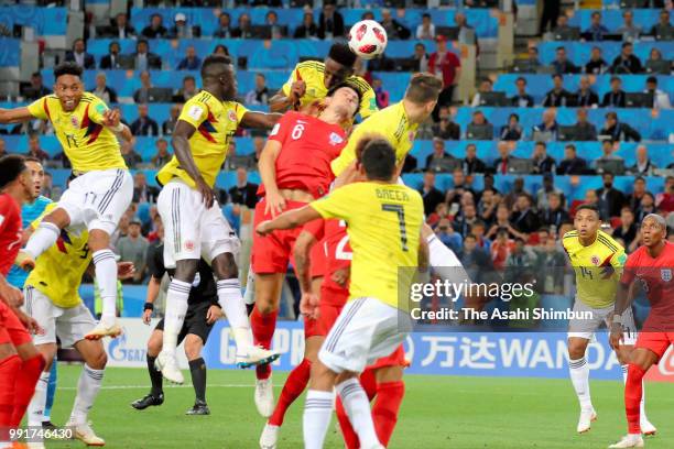 Yerry Mina of Colombia heads the ball to score his side's first goal during the 2018 FIFA World Cup Russia Round of 16 match between Colombia and...