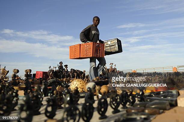 South African vendors dispalay and sell african merchandise and articraft on King's beach promenade on May 13, 2010 in Port Elizabeth, South Africa....