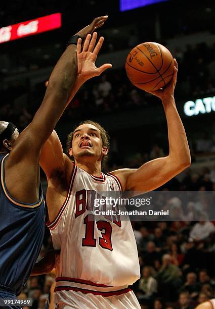 Joakim Noah of the Chicago Bulls puts up a shot against the Washington Wizards at the United Center on January 15, 2010 in Chicago, Illinois. The...