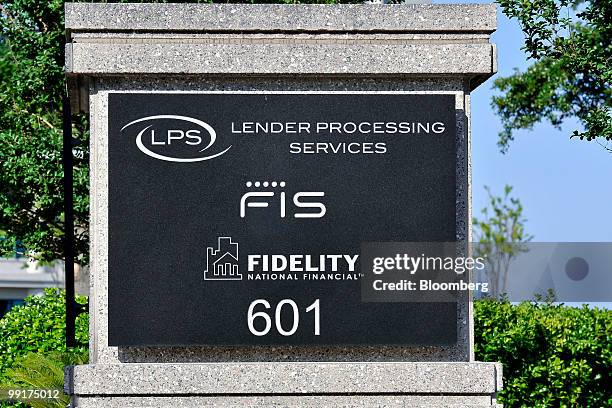 Signage stands outside the headquarters of Fidelity National Information Services Inc. In Jacksonville, Florida, U.S., on Wednesday, May 12, 2010....