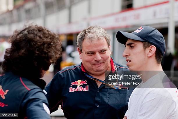 Sebastien Buemi of Switzerland and Scuderia Toro Rosso is seen with Toro Rosso Technical Director Giorgio Ascanelli and Chief Engineer Laurent Mekies...