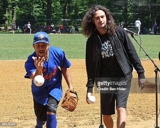 Actors Corbin Bleu and Constantine Maroulis throw the opening pitch for the 56th Season of the Broadway Softball League opening day at Central Park,...