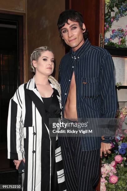 Kelly Osbourne and Kyle De Volle seen attending Gay Times: Pride Dinner at The Ivy Market Grill on July 4, 2018 in London, England.