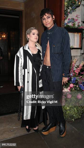 Kelly Osbourne and Kyle De Volle seen attending Gay Times: Pride Dinner at The Ivy Market Grill on July 4, 2018 in London, England.