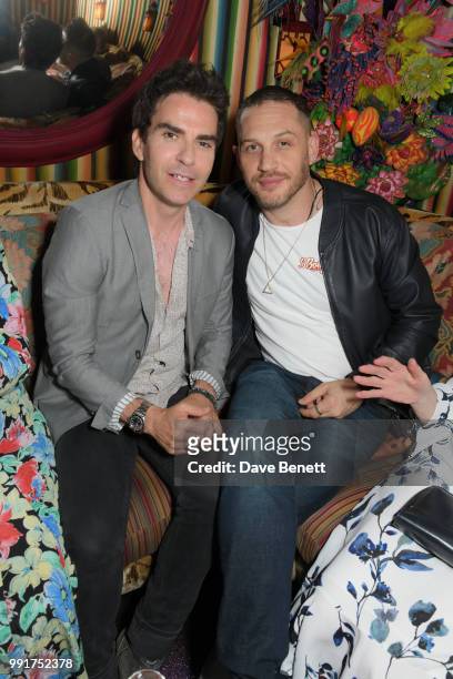 Kelly Jones and Tom Hardy attend the after party for the UK Premiere of "Swimming With Men' at Loulou's on July 4, 2018 in London, England.