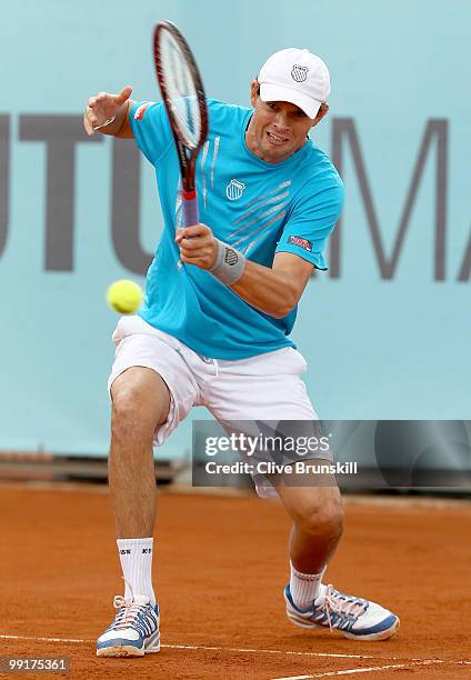 Bob Bryan of the USA in action against Benjamin Becker of Germany and Marco Chiudinelli of Switzerland in their second round doubles match during the...