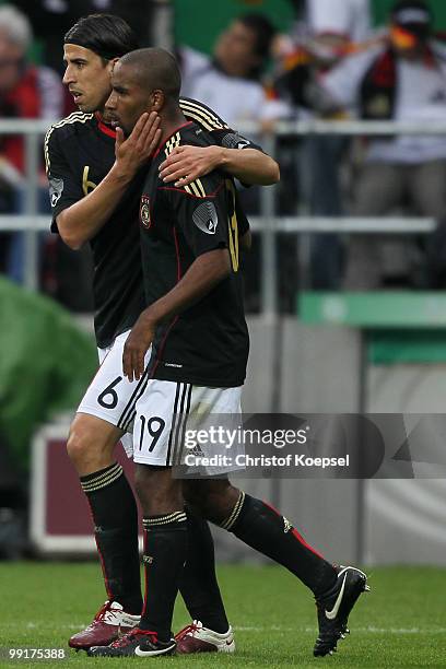 Cacau of Germany celebrates the second goal with Sami Khedira during the international friendly match between Germany and Malta at Tivoli stadium on...