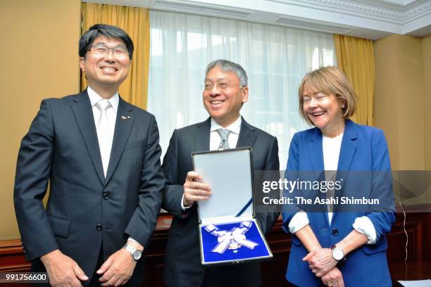 Nobel Prize laureate in Literature Kazuo Ishiguro and his wife Lorma poses with Nagasaki City Mayor Tomihisa Taue on July 3, 2018 in London, England.