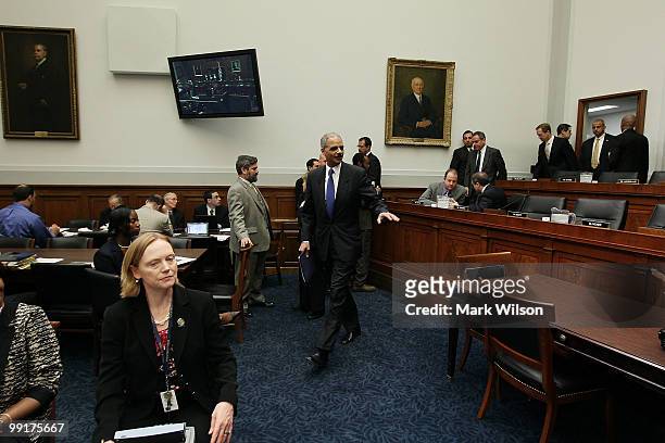 Attorney General Eric Holder arrives at a House Judiciary Committee hearing on Capitol Hill May 13, 2010 in Washington, DC. Attorney General Holder...