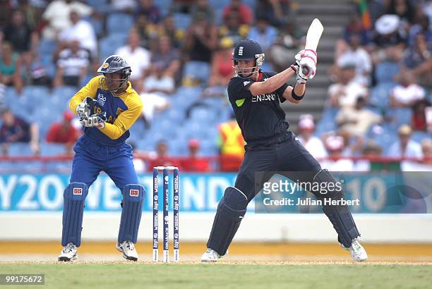 Kumar Sangakkara of Sri Lanka looks on as Craig Kieswetter hits out during the semi final of the ICC World Twenty20 between England and Sri Lanka at...