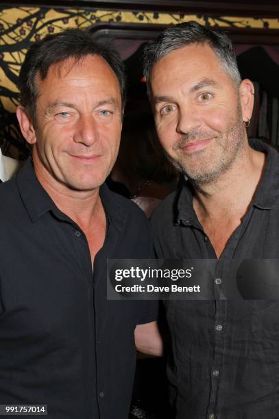 Jason Isaacs and Ol Parker attend the after party for the UK Premiere of "Swimming With Men' at Loulou's on July 4, 2018 in London, England.