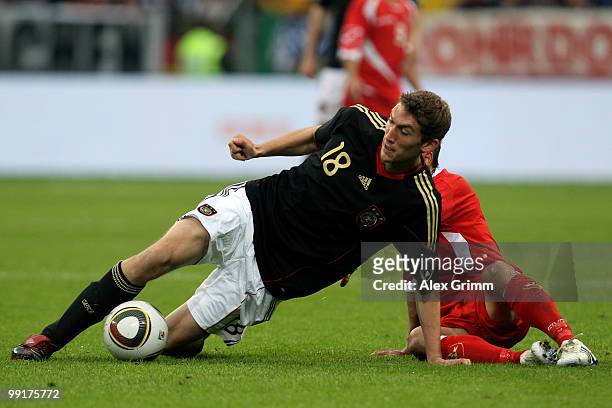 Stefan Reinartz of Germany is challenged by Andrew Cohen of Malta during the international friendly match between Germany and Malta at Tivoli stadium...
