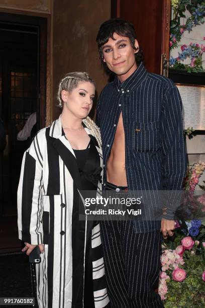 Kelly Osbourne and Kyle De Volle seen attending Gay Times: Pride Dinner at The Ivy Market Grill on July 4, 2018 in London, England.