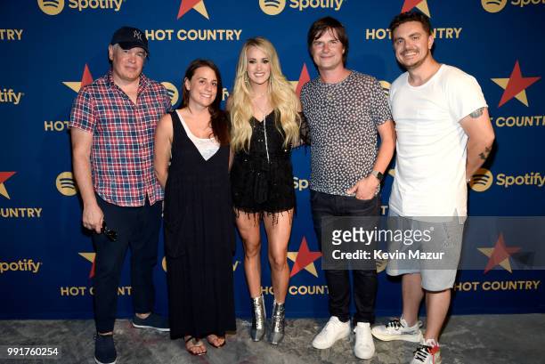 Spotify Head of Music Culture Doug Ford, Spotify's Rachel Ghiazza, Carrie Underwood, Spotify VP Shows and Editorial Nick Holmsten and Spotify Head of...