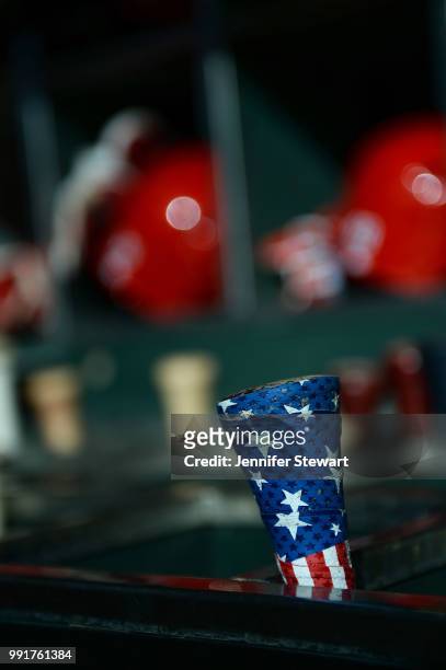 Bat wrapped in American flag tape sits in the bat rack prior to the MLB game between the St. Louis Cardinals and Arizona Diamondbacks at Chase Field...