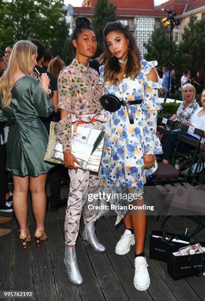 Models Anuthida Ploypetch and Taraneh Shayesteh attend the Marcel Ostertag show during the Berlin Fashion Week Spring/Summer 2019 at Westin Grand...