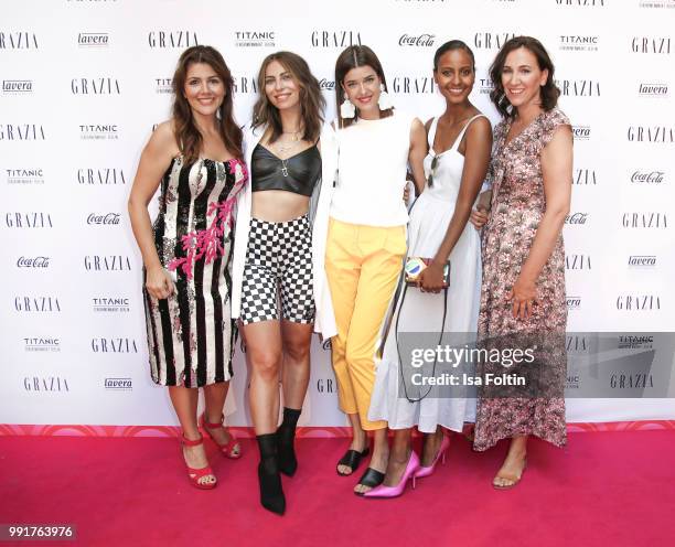 Sedef Ayguen, Masha Sedgwick, Marie Nasemann, Sara Nuru and Claudia ten Hoevel during the Grazia Pink Hour at Titanic Hotel on July 4, 2018 in...
