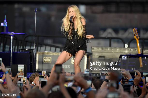 Carrie Underwood performs on stage at the Spotify's Hot Country Live Series with Carrie Underwood, Dan + Shay and Filmore at Pier 17 on July 4, 2018...