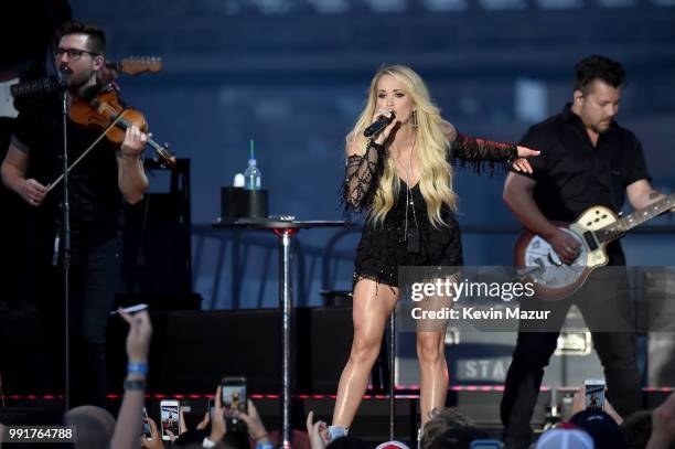 Carrie Underwood performs on stage at the Spotify's Hot Country Live Series with Carrie Underwood, Dan + Shay and Filmore at Pier 17 on July 4, 2018...