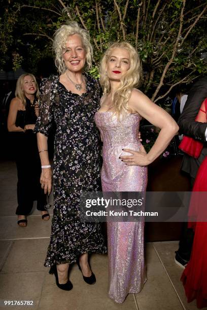 Ellen Von Unwerth and Angela Ismailos attend the amfAR Paris Dinner at The Peninsula Hotel on July 4, 2018 in Paris, France.