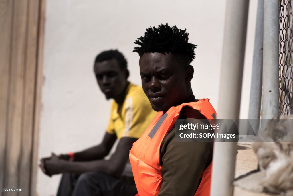 A migrant is seen wearing a life jacket.
Spanish Maritime...