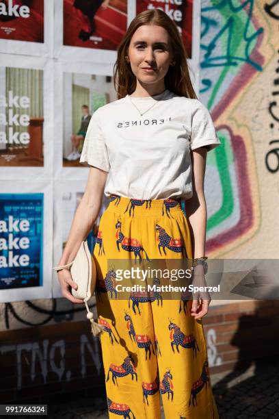 Katharina Schmickler is seen attending minimum launches SS19 collection wearing yellow animal print pants during the Berlin Fashion Week July 2018 on...