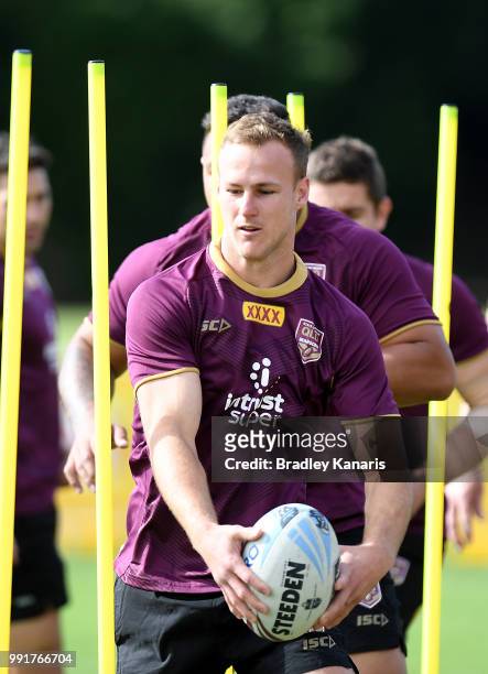 Daly Cherry-Evans runs through a training drill during a Queensland Maroons State of Origin training session at Sanctuary Cove on July 5, 2018 in...