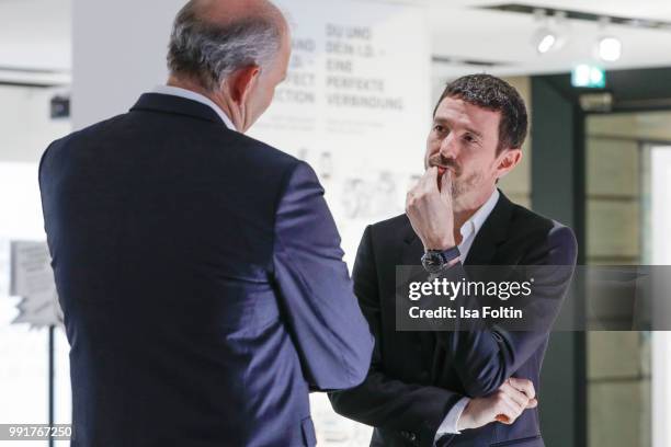 Juergen Stackmann and Oliver Berben during the exhibition preview of 'Driving Vizzions to Reality' at DRIVE. Volkswagen Group Forum on July 4, 2018...