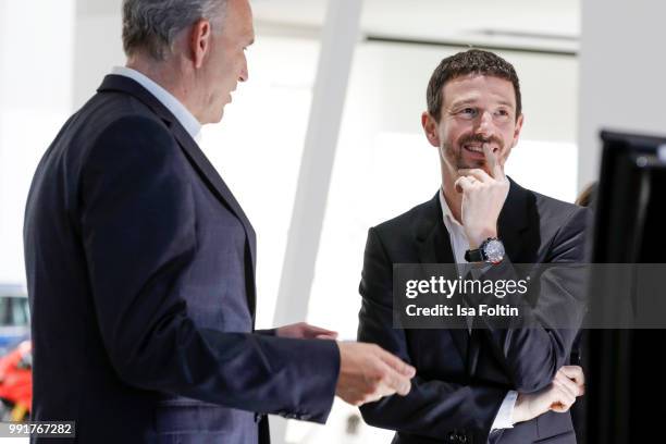 Juergen Stackmann and Oliver Berben during the exhibition preview of 'Driving Vizzions to Reality' at DRIVE. Volkswagen Group Forum on July 4, 2018...