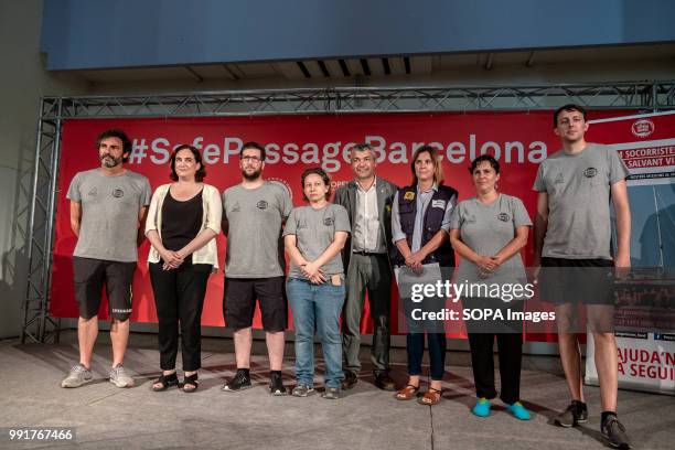 All participants of the Open Arms press conference are seen on stage. Following the arrival in Barcelona of the rescue vessel Open Arms, Óscar Camps,...