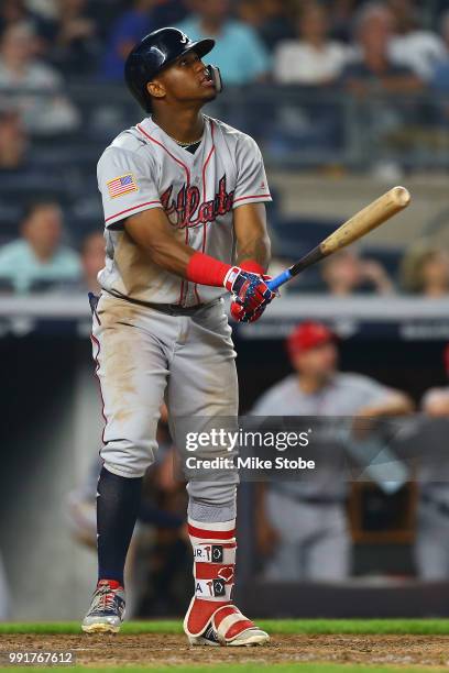 Ronald Acuna Jr. #13 of the Atlanta Braves hits a 2-run game winning home run in the top of the eleventh inning against the New York Yankees at...