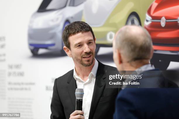 Oliver Berben and Peik von Bestenbostel during the exhibition preview of 'Driving Vizzions to Reality' at DRIVE. Volkswagen Group Forum on July 4,...