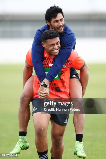 Caleb Clarke carries Melani Nani during a Blues Super Rugby training session at Blues HQ on July 5, 2018 in Auckland, New Zealand.