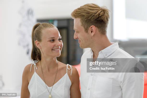 Sonja Gerhardt and Timur Bartels during the exhibition preview of 'Driving Vizzions to Reality' at DRIVE. Volkswagen Group Forum on July 4, 2018 in...