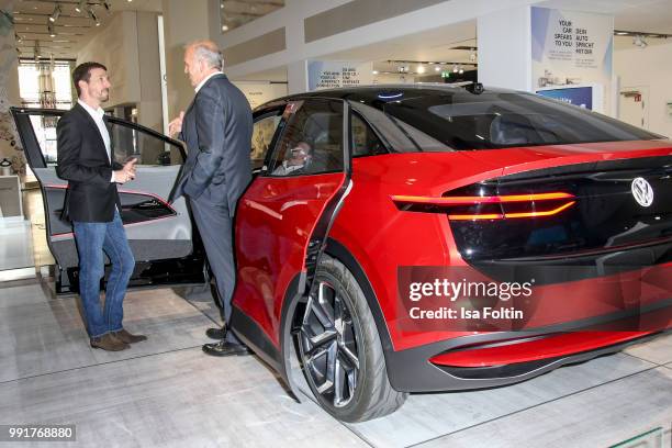 Juergen Stackmann and Oliver Berben during the exhibition preview of 'Driving Vizzions to Reality' at DRIVE. Volkswagen Group Forum on July 4, 2018...