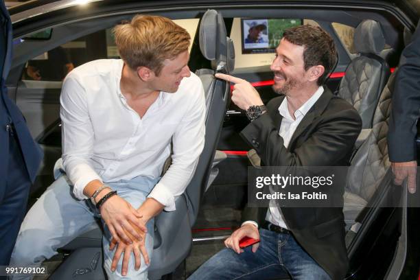 Timur Bartels and Oliver Berben during the exhibition preview of 'Driving Vizzions to Reality' at DRIVE. Volkswagen Group Forum on July 4, 2018 in...