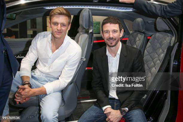Timur Bartels and Oliver Berben during the exhibition preview of 'Driving Vizzions to Reality' at DRIVE. Volkswagen Group Forum on July 4, 2018 in...