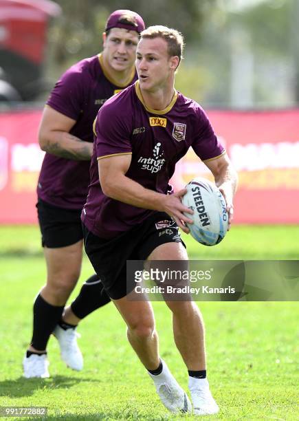 Daly Cherry-Evans looks to pass during a Queensland Maroons State of Origin training session at Sanctuary Cove on July 5, 2018 in Gold Coast,...