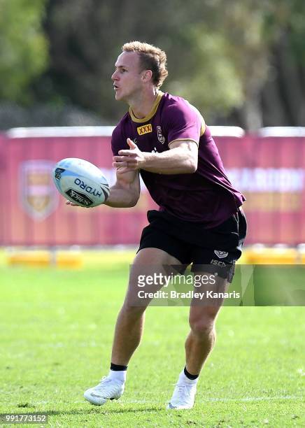 Daly Cherry-Evans passes the ball during a Queensland Maroons State of Origin training session at Sanctuary Cove on July 5, 2018 in Gold Coast,...